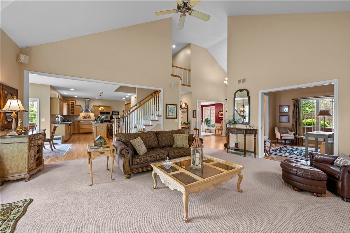 430 Alberosky Way Batavia, IL 60510 - Photo 11 of 49 a living room with furniture and a chandelier