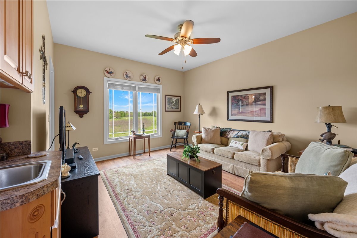 430 Alberosky Way Batavia, IL 60510 - Photo 18 of 49 a living room with furniture and a large window