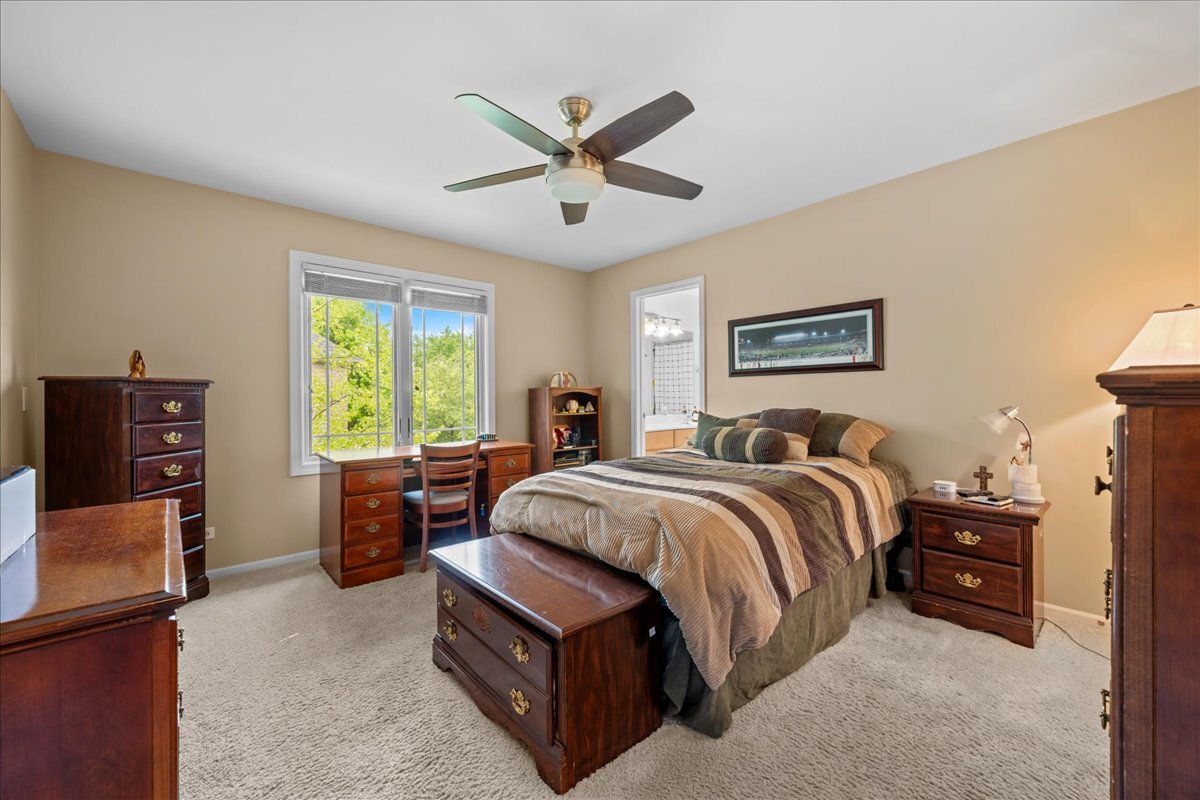 430 Alberosky Way Batavia, IL 60510 - Photo 26 of 49 a spacious bedroom with a bed and window