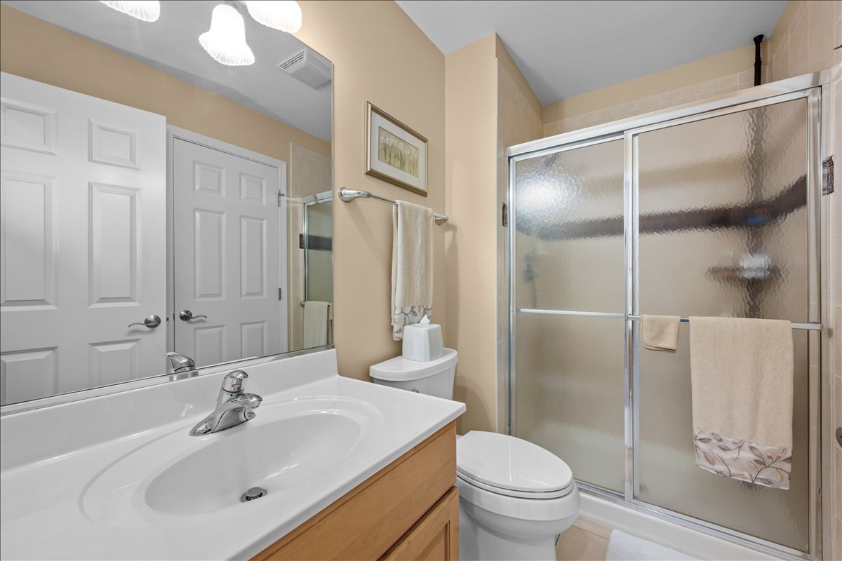 430 Alberosky Way Batavia, IL 60510 - Photo 30 of 49 a bathroom with a sink toilet and shower