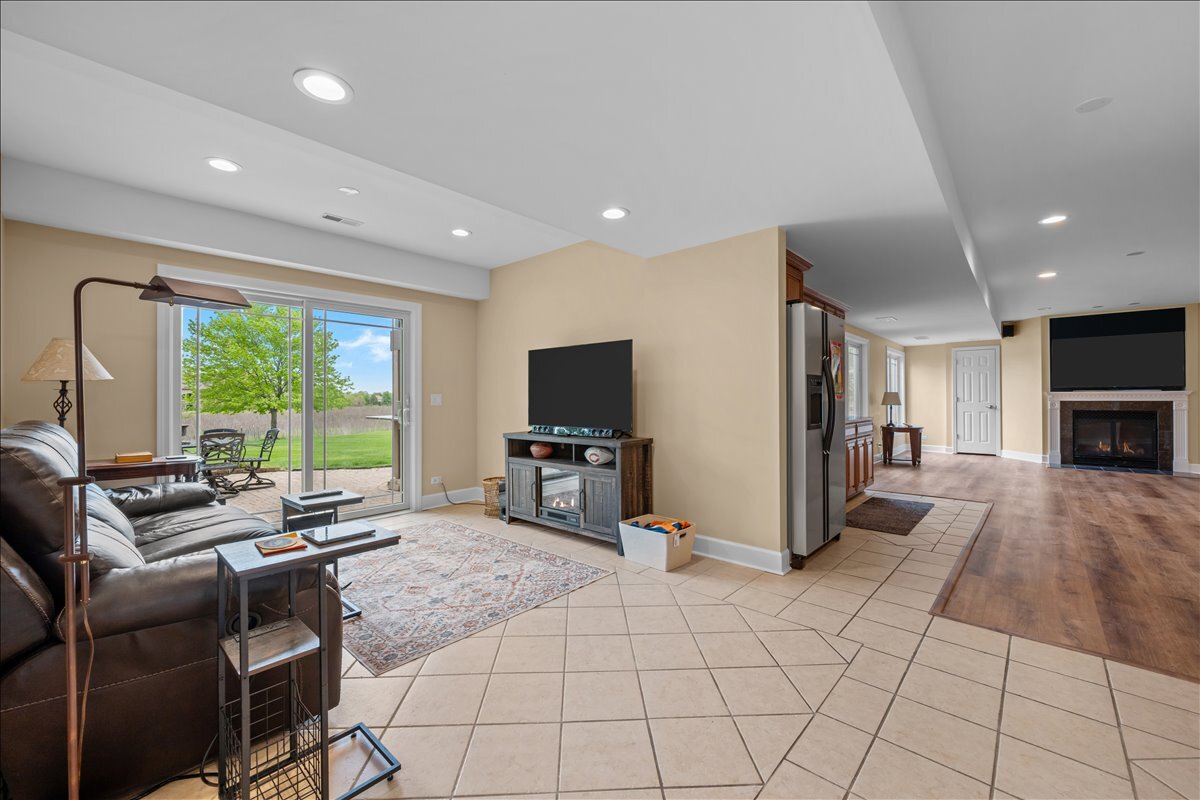 430 Alberosky Way Batavia, IL 60510 - Photo 32 of 49 a living room with furniture and a flat screen tv