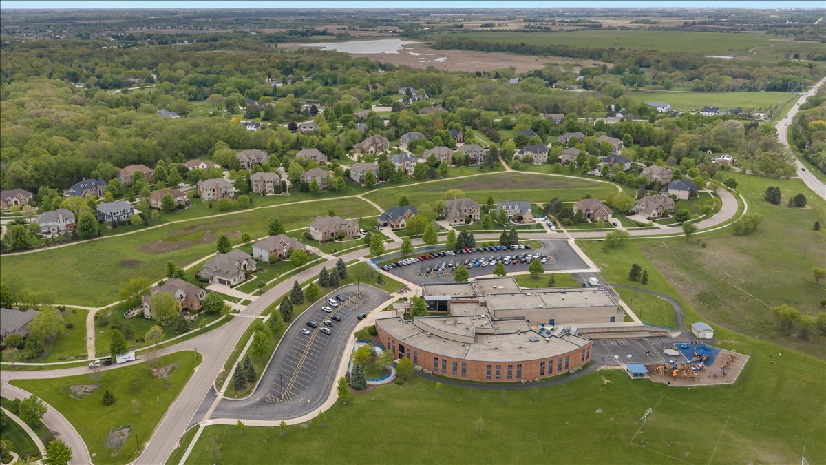 430 Alberosky Way Batavia, IL 60510 - Photo 48 of 49 an aerial view of a house with a big yard