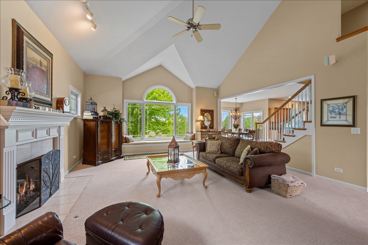 430 Alberosky Way Batavia, IL 60510 - Photo 10 of 49 a living room with furniture and a fireplace