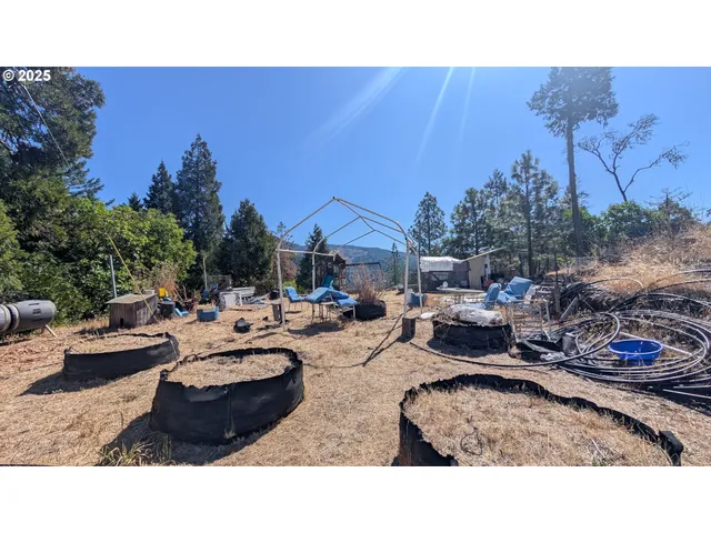 a living room with furniture and a painting