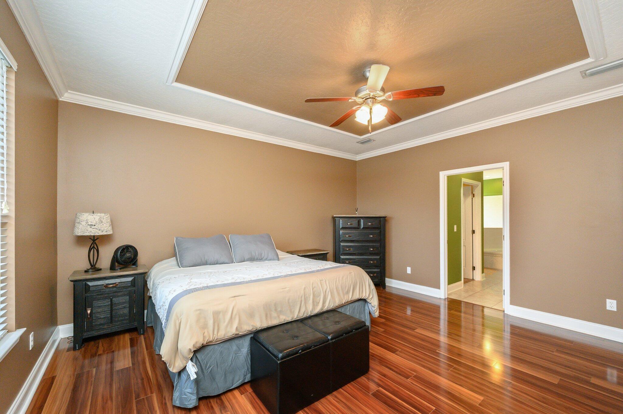 203 Eleases Crossing Crestview, FL 32539 - Photo 18 of 43 a bedroom with a bed and a view of kitchen