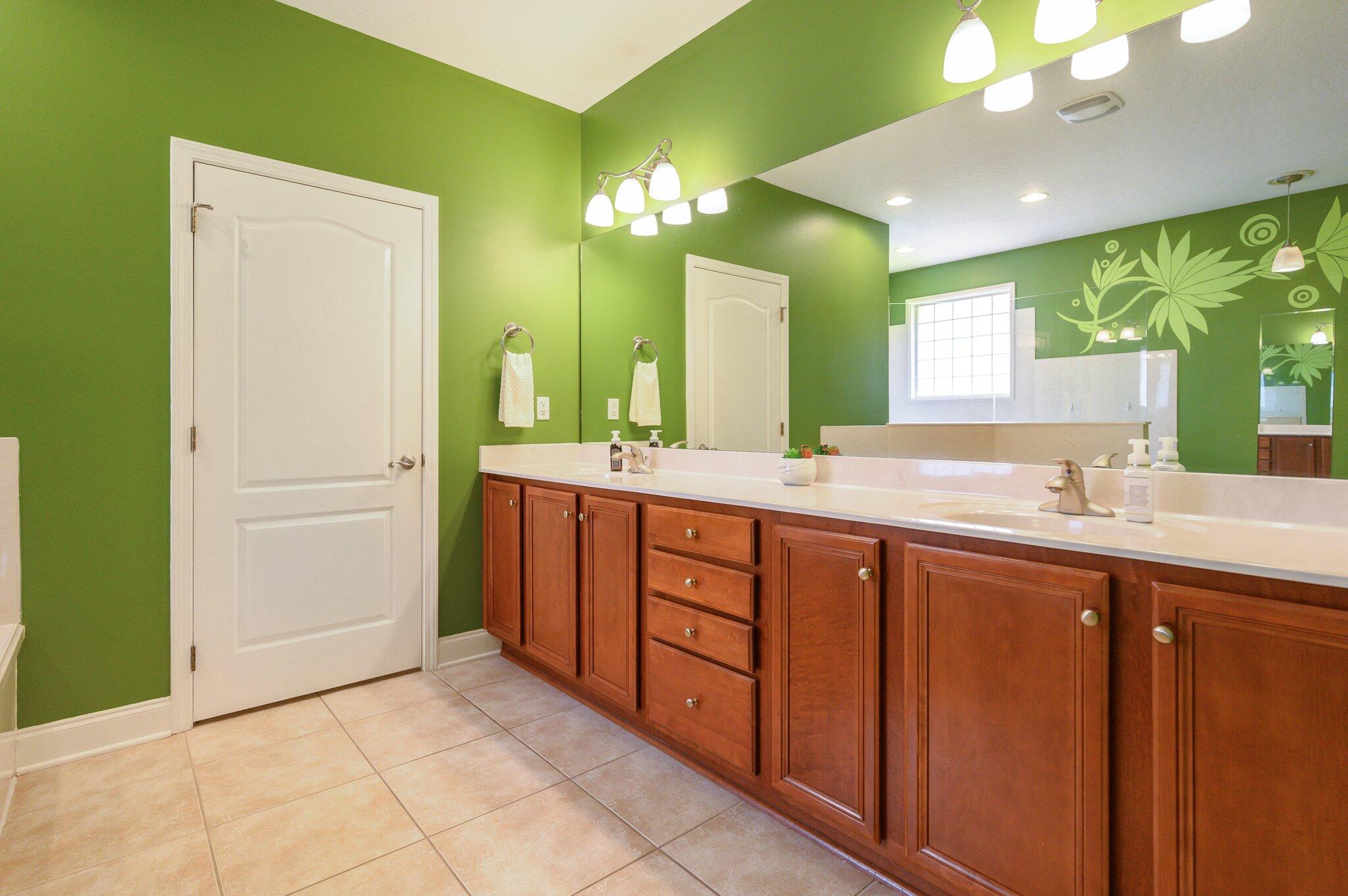 203 Eleases Crossing Crestview, FL 32539 - Photo 20 of 43 a bathroom with a double vanity sink and a mirror