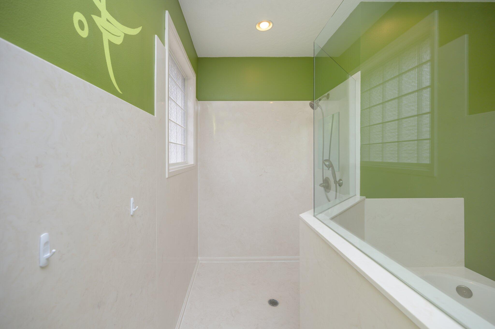 203 Eleases Crossing Crestview, FL 32539 - Photo 22 of 43 a bathroom with a bathtub and a shower