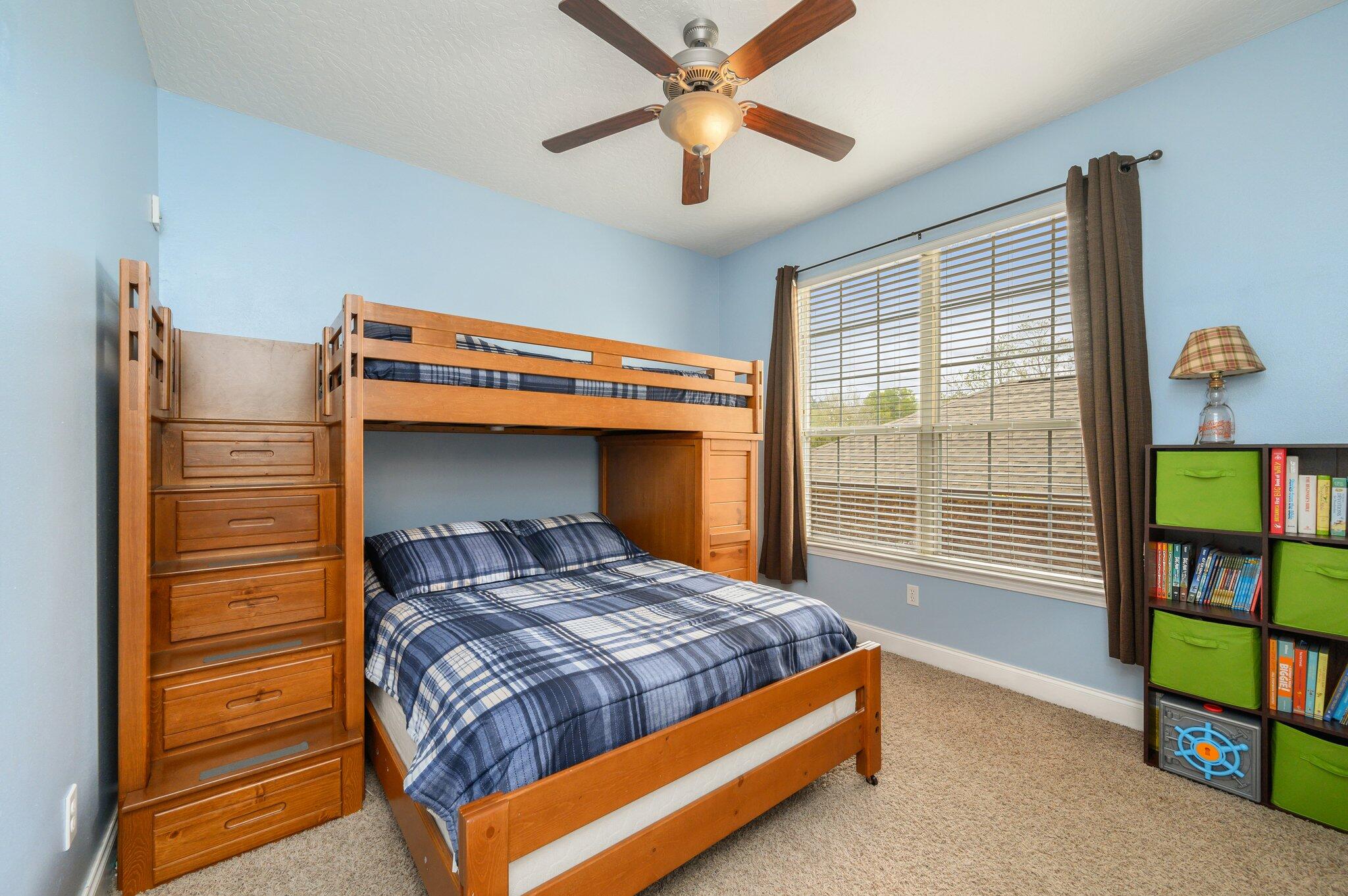 203 Eleases Crossing Crestview, FL 32539 - Photo 27 of 43 a bedroom with a bed and a window