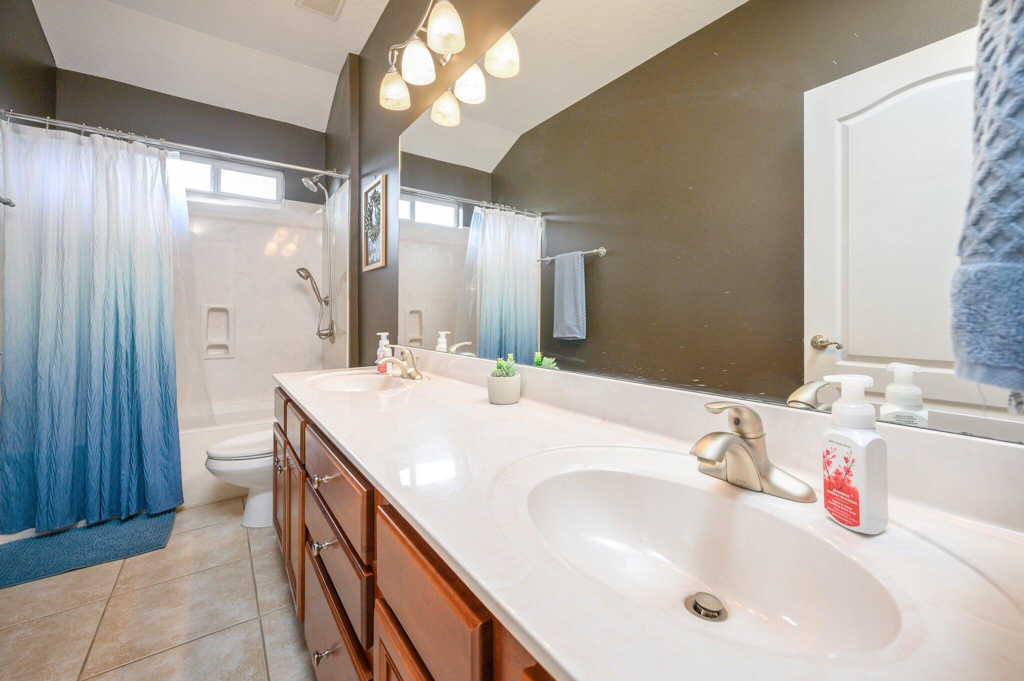 203 Eleases Crossing Crestview, FL 32539 - Photo 29 of 43 a bathroom with a sink and a mirror
