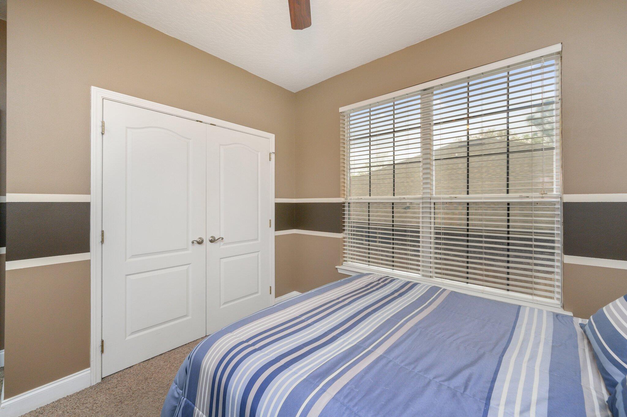 203 Eleases Crossing Crestview, FL 32539 - Photo 34 of 43 a bedroom with a bed and a window