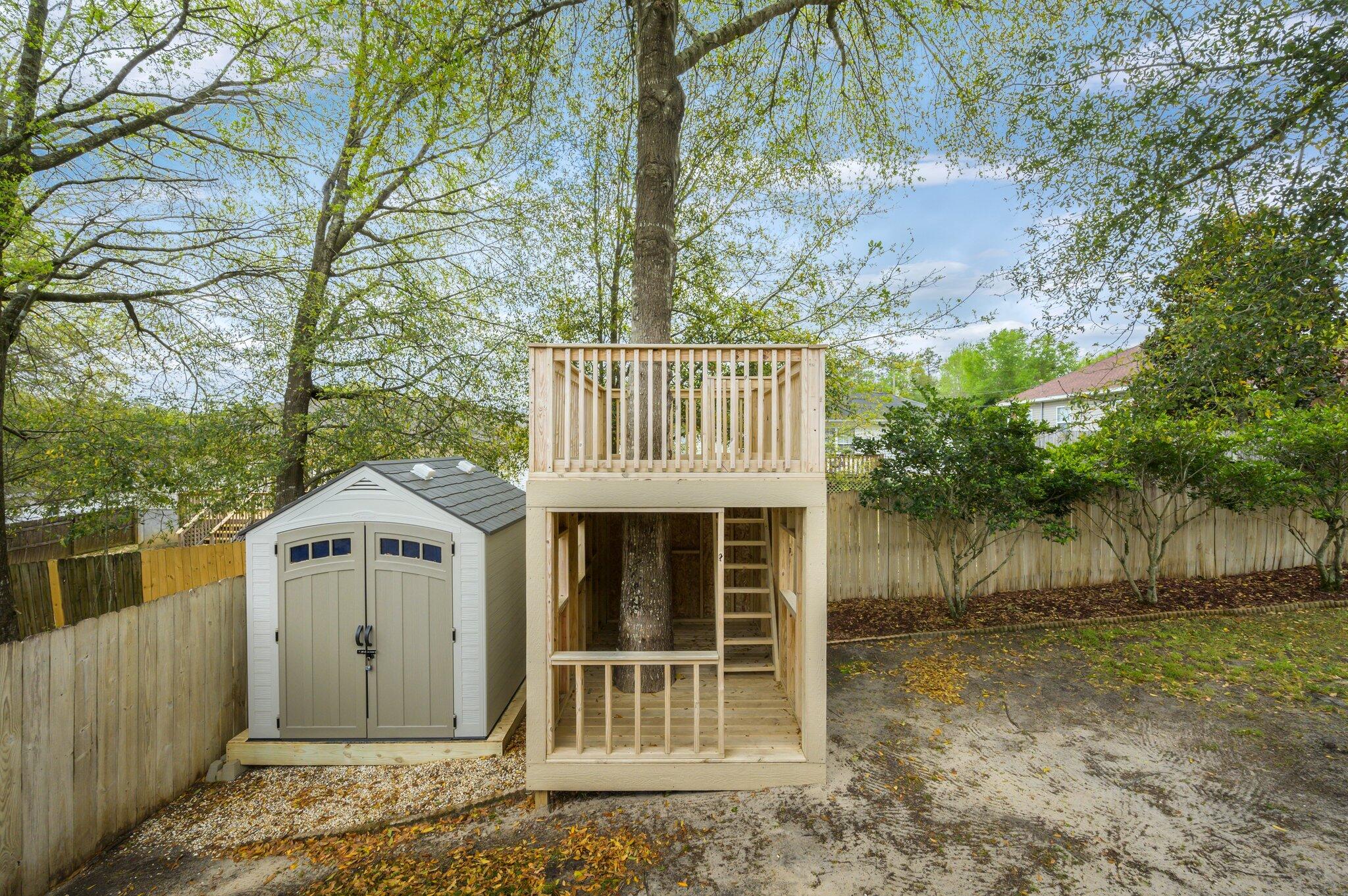 203 Eleases Crossing Crestview, FL 32539 - Photo 37 of 43 a view of a house with a yard and large tree