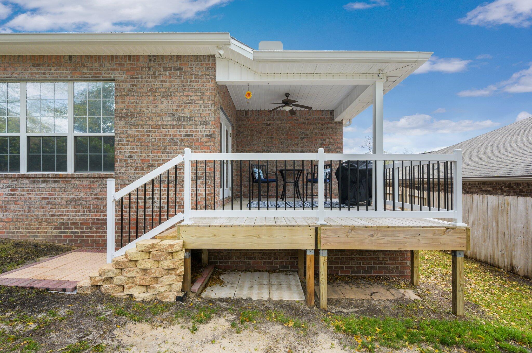 203 Eleases Crossing Crestview, FL 32539 - Photo 40 of 43 a balcony with table and chairs