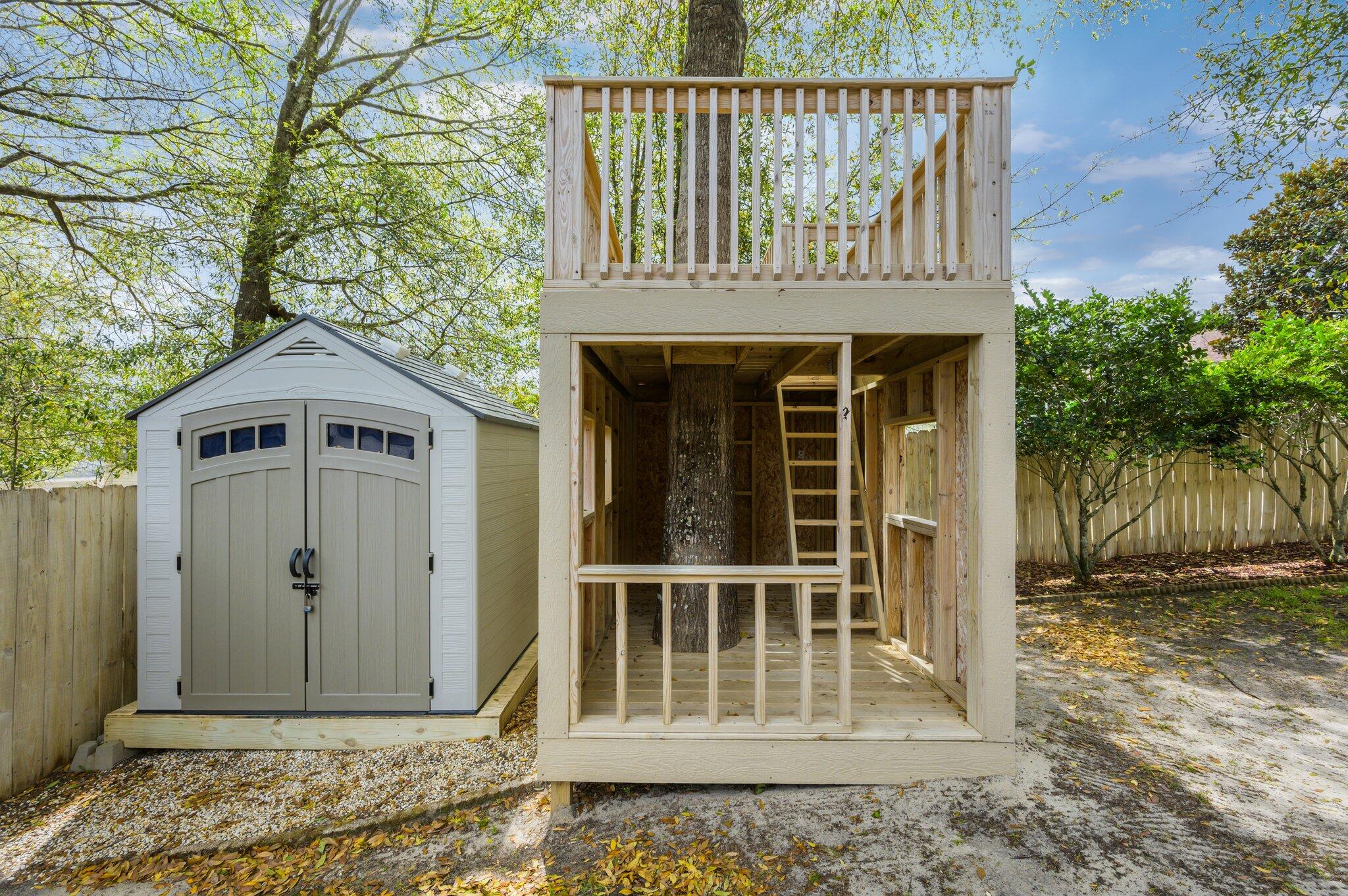 203 Eleases Crossing Crestview, FL 32539 - Photo 41 of 43 a front view of a house with a garden