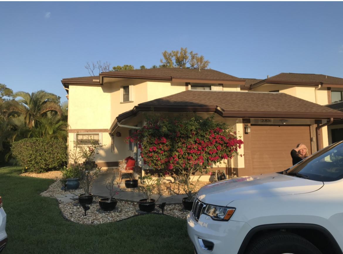 20836 Boca Ridge Drive North Boca Raton, FL 33428 - Photo 1 of 12 a car parked in front of a house