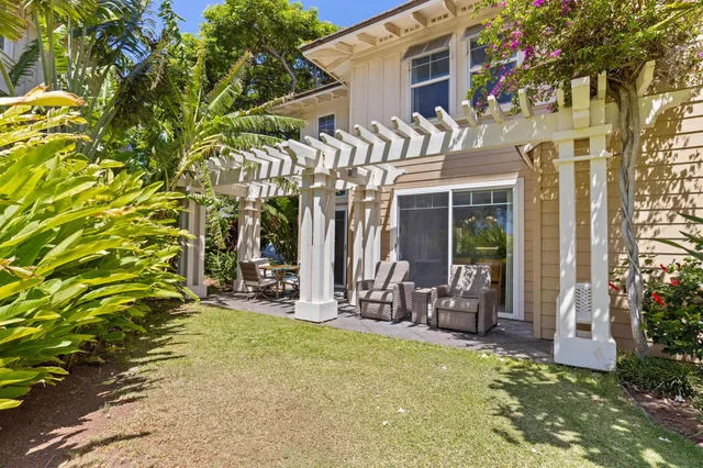 a view of a building with sitting area
