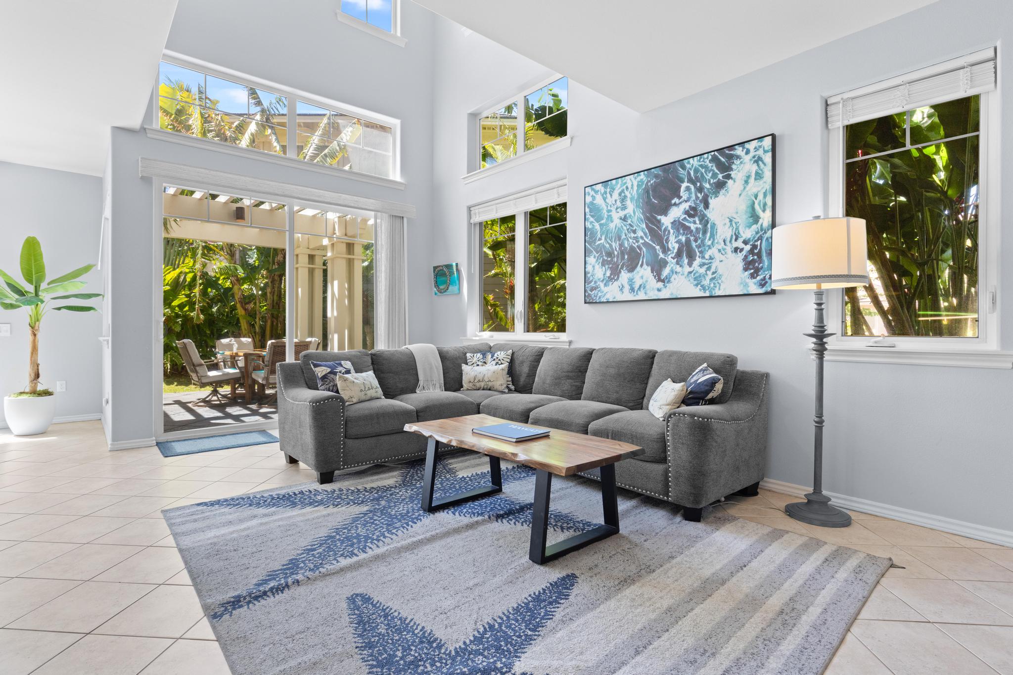 69-200 Pohakulana Place, Unit C4 Waikoloa, HI 96738 - Photo 6 of 30 a living room with furniture and a large window