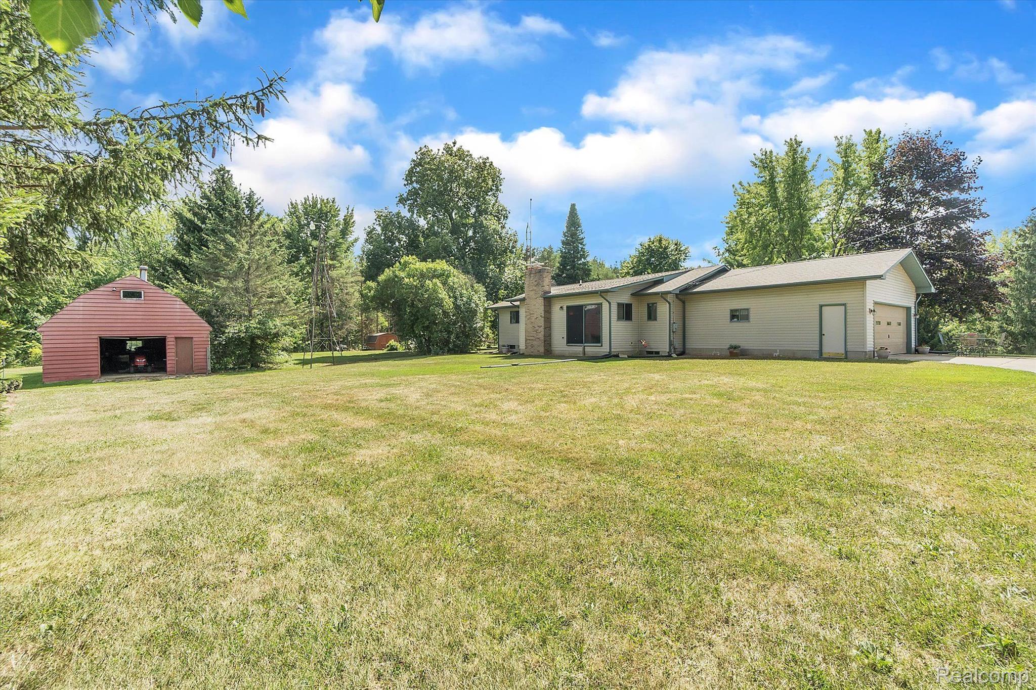 12265 Sharp Road Linden, MI 48451 - Photo 2 of 34 Rear View of Home and Pole Barn