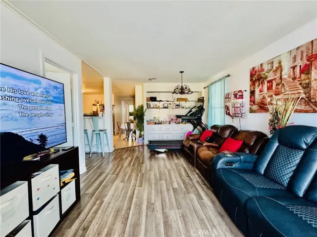 a bedroom with a bed and flat screen tv