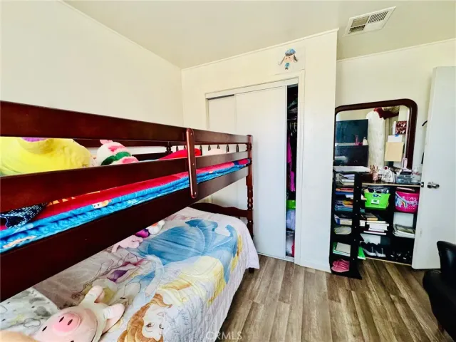 a bathroom with a sink a mirror and a toilet