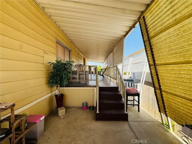 a balcony view with a tub