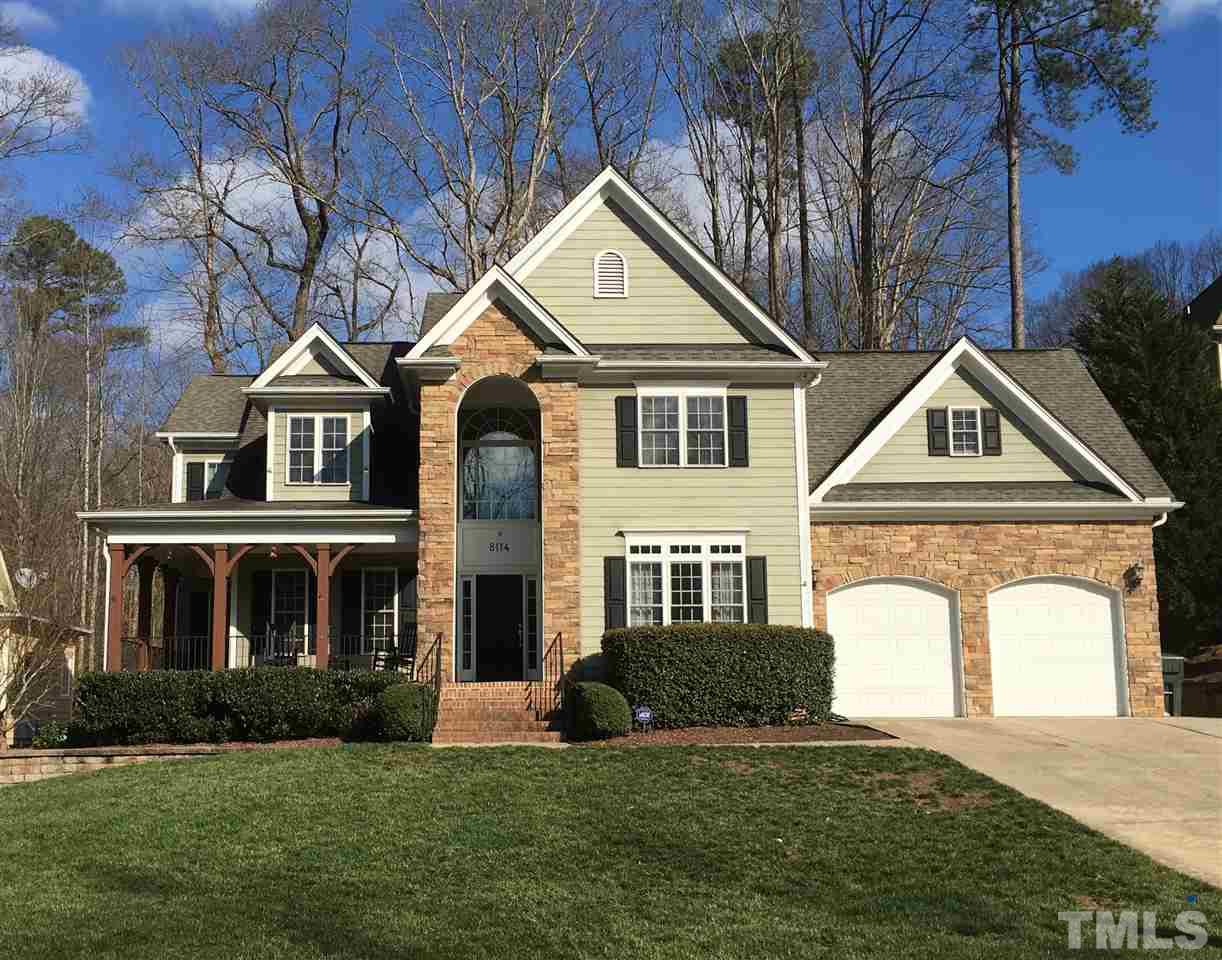8114 Dreamy Way Raleigh, NC 27613 - Photo 1 of 22 a front view of a house with a yard