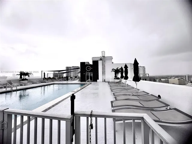 a view of a car park in front of a building