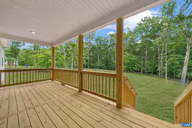 a view of backyard with green space
