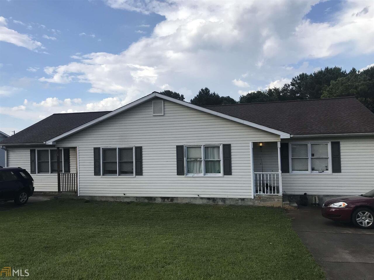 563 Hendrix Road Rockmart, GA 30153 - Photo 1 of 1 a view of a house with a backyard
