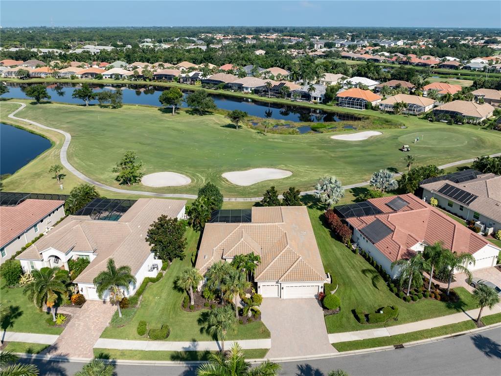 523 Sawgrass Bridge Road Venice, FL 34292 - Photo 1 of 1 SWEEPING VIEWS OF 7TH FAIRWAY AND PONDS.