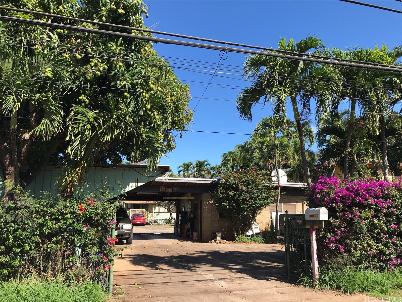 84-290 Makaha Valley Road Waianae, HI 96792 - Photo 1 of 1 a view of a street with potted plants