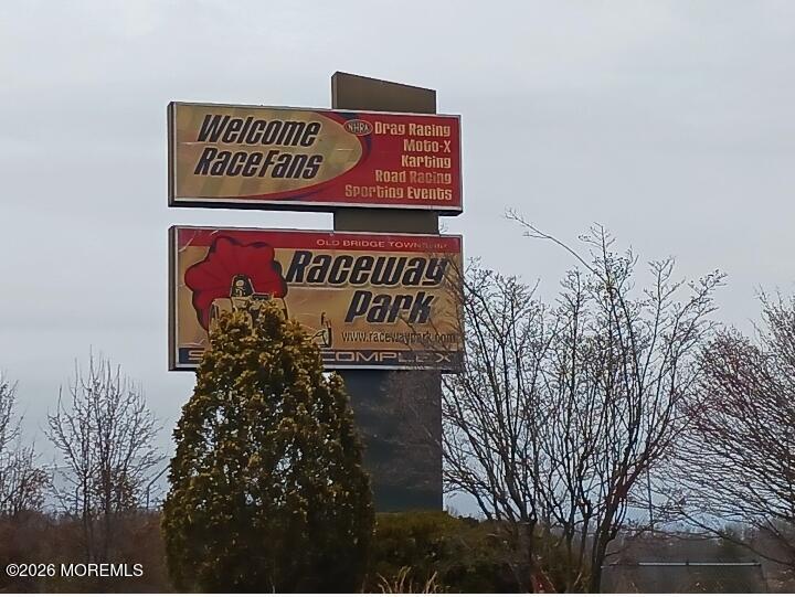 115 Pension Road Manalapan, NJ 07726 - Photo 14 of 19 a sign on the side of a building