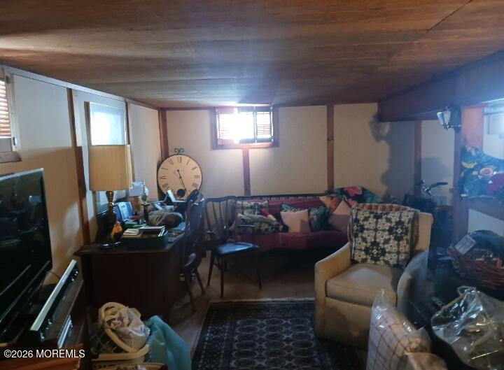 115 Pension Road Manalapan, NJ 07726 - Photo 19 of 19 a living room with furniture and a mirror