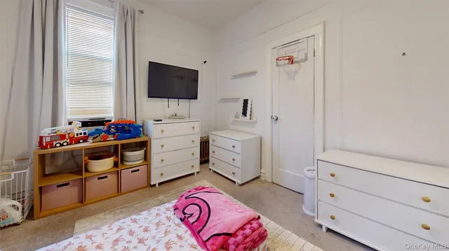 a room with cabinets and window