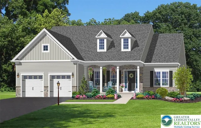 a front view of house with yard and green space