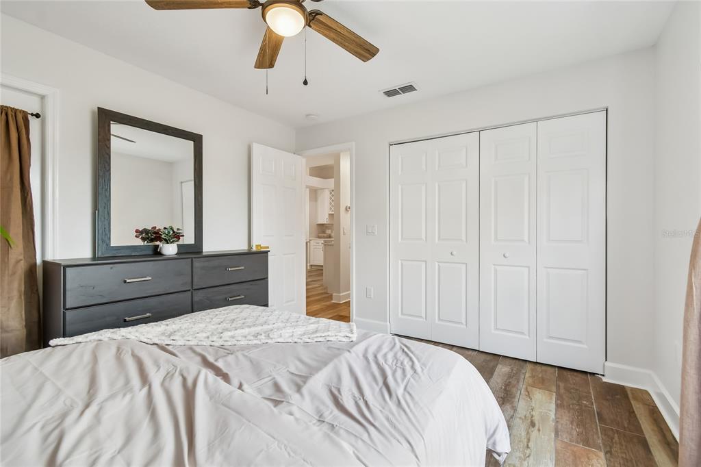 2513 North Valrico Road Seffner, FL 33584 - Photo 42 of 76 a bed room with a bed and a mirror