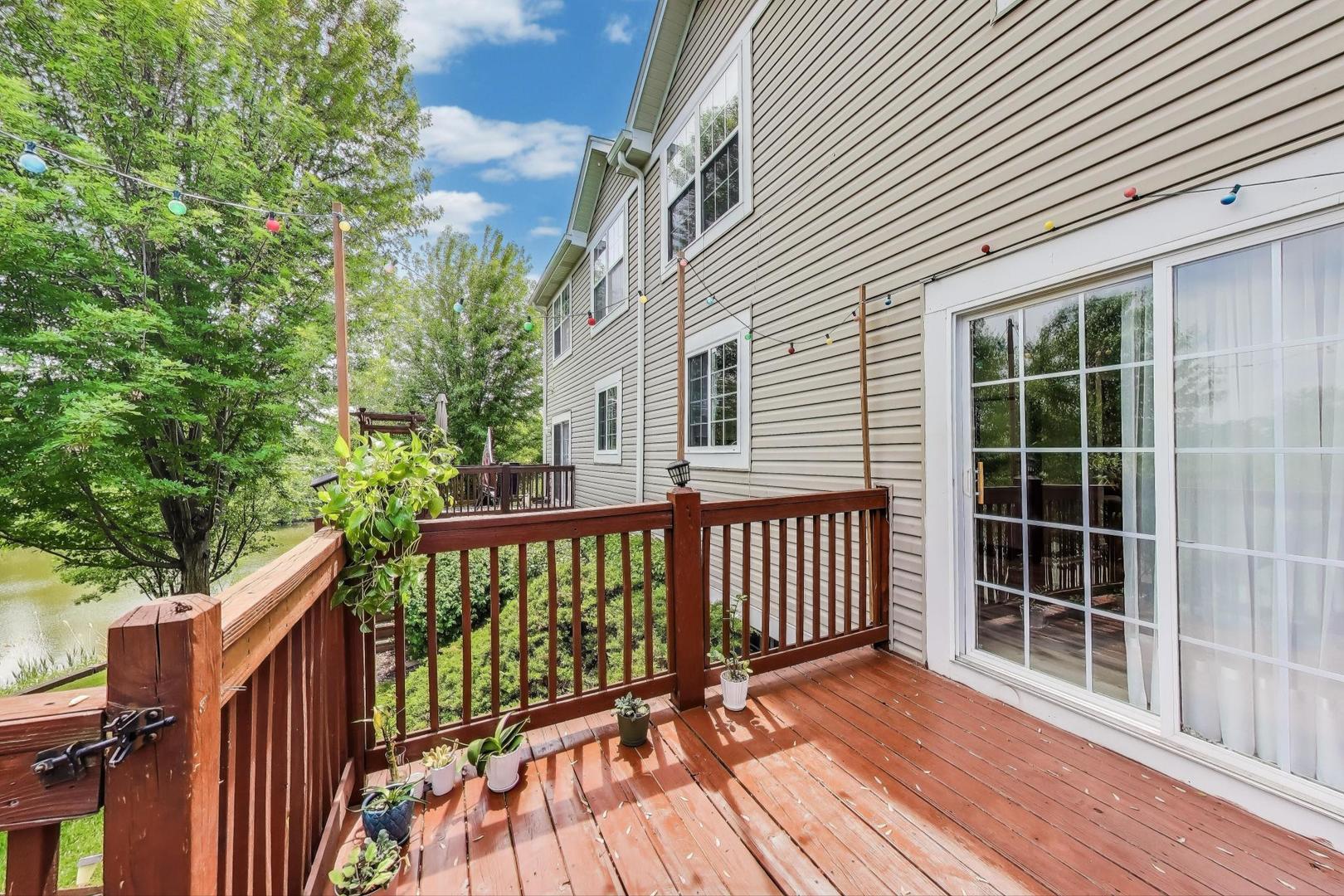 532 Declaration Lane Aurora, IL 60502 - Photo 26 of 34 a view of a wooden deck