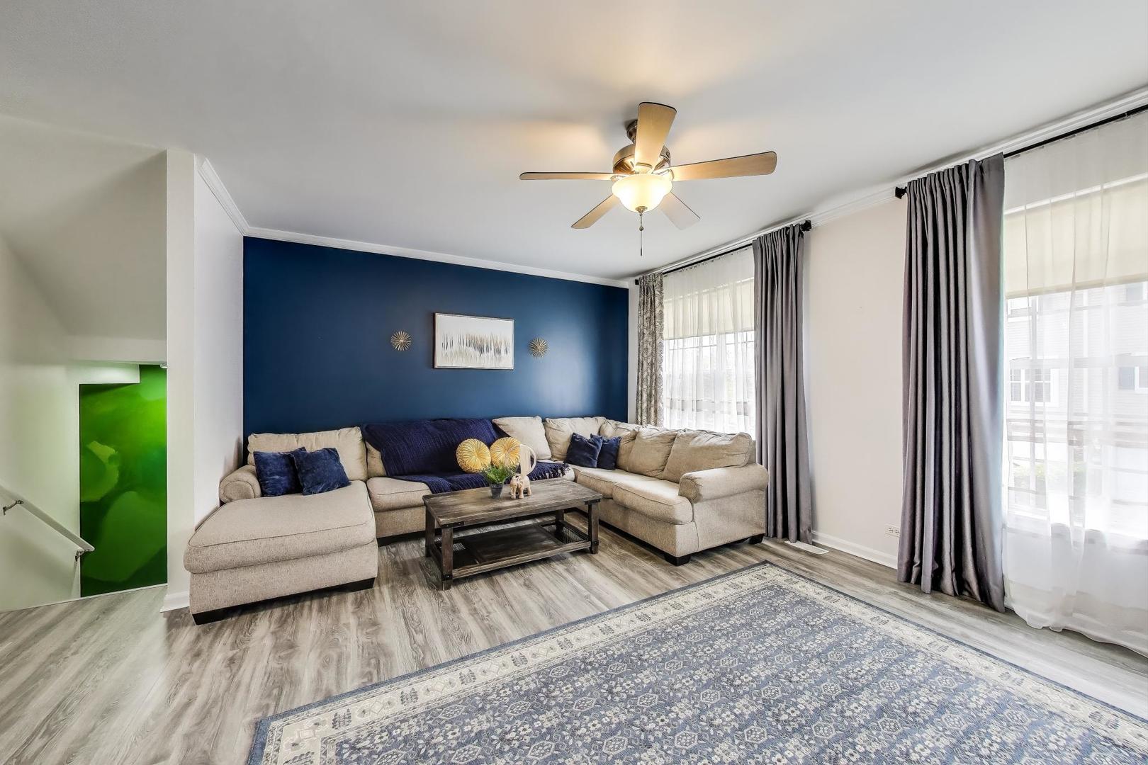 532 Declaration Lane Aurora, IL 60502 - Photo 4 of 34 a living room with furniture and a large window