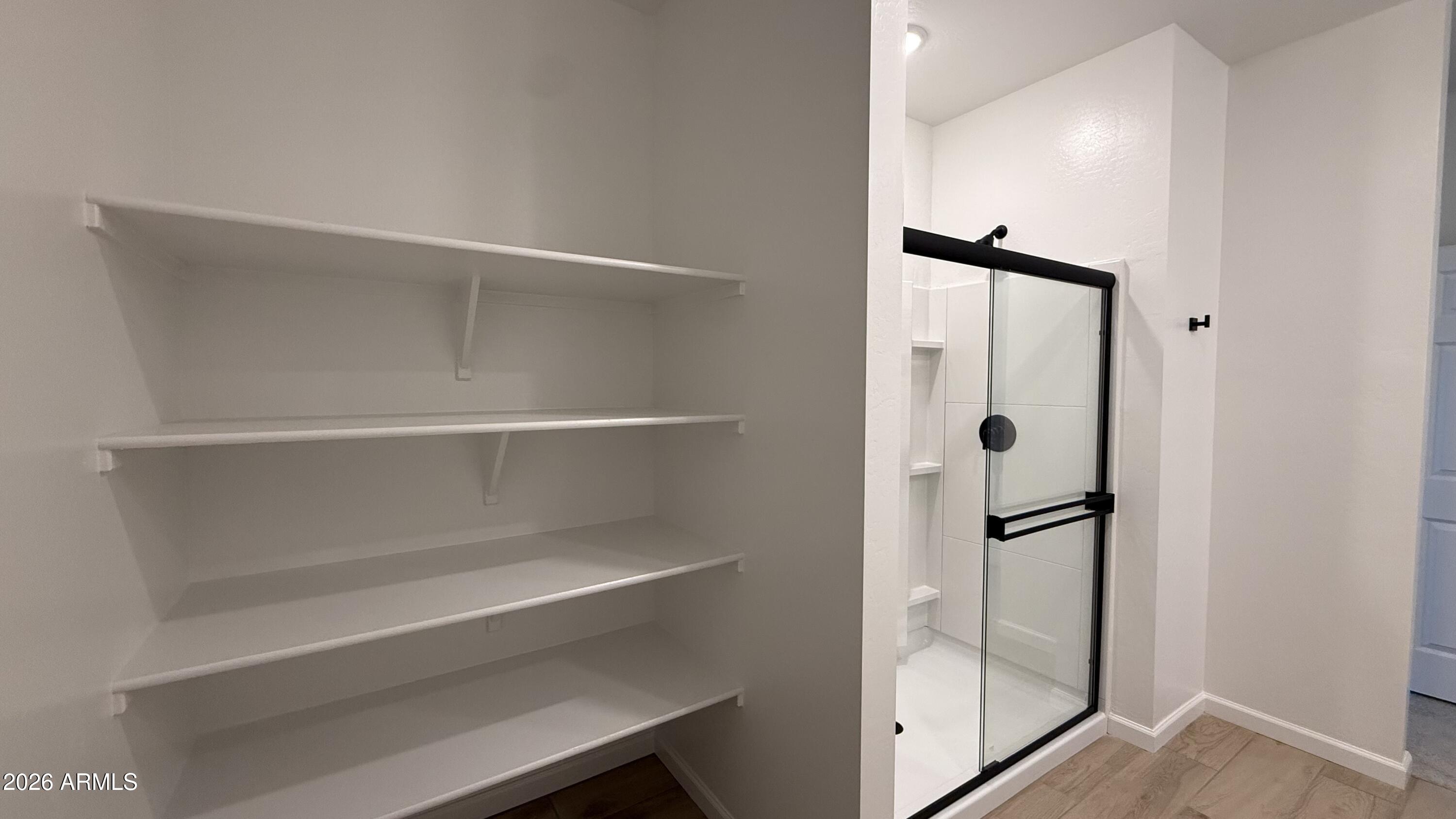 46818 West Old Timer Road Maricopa, AZ 85139 - Photo 17 of 34 a view of a walk in closet