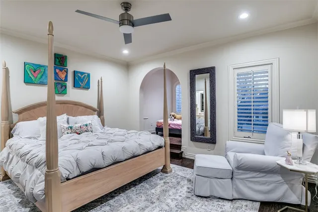 a dining room with furniture a rug and a chandelier