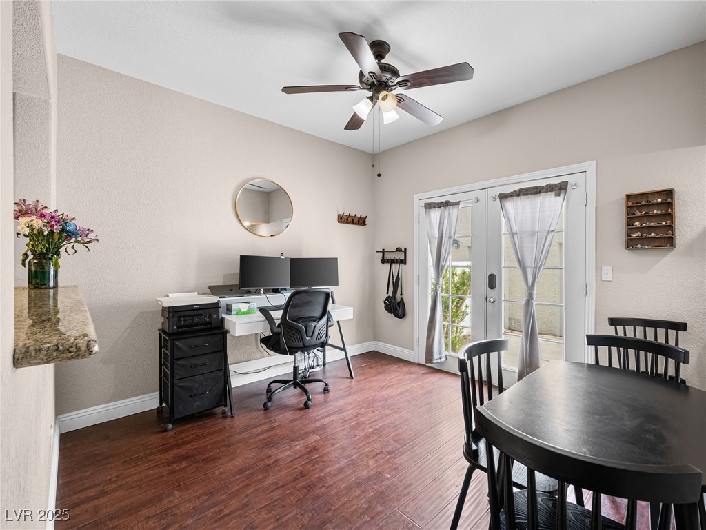 353 Seine Way, Unit N Henderson, NV 89014 - Photo 10 of 36 Office area with a ceiling fan, wood finished floors, baseboards, and french doors