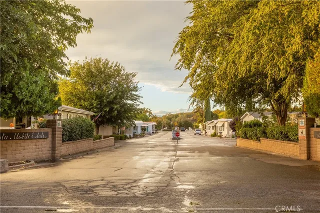 a view of road with trees