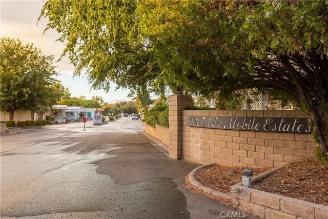 a view of a street with trees