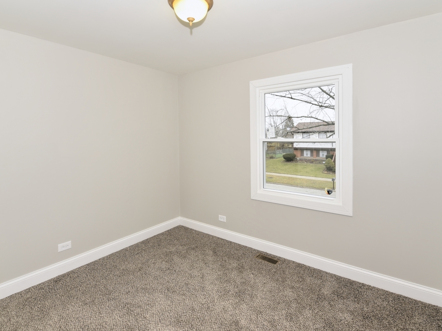 5605 Crestwood Road Matteson, IL 60443 - Photo 11 of 21 an empty room with a window
