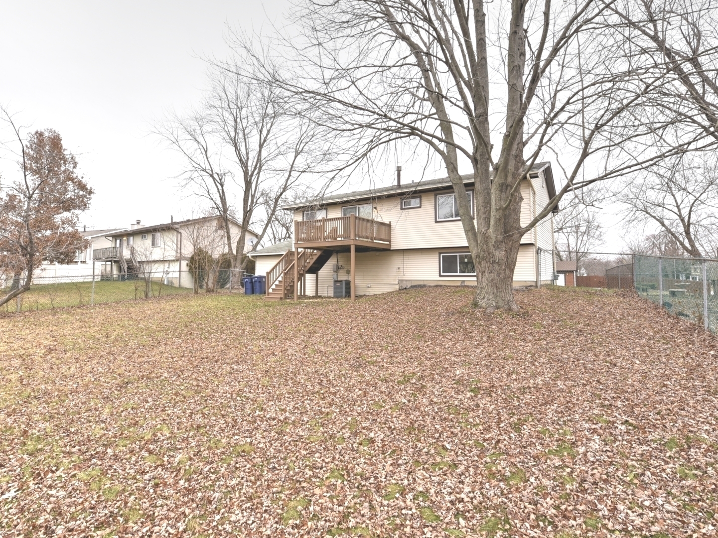 5605 Crestwood Road Matteson, IL 60443 - Photo 20 of 21 a view of a yard with a tree