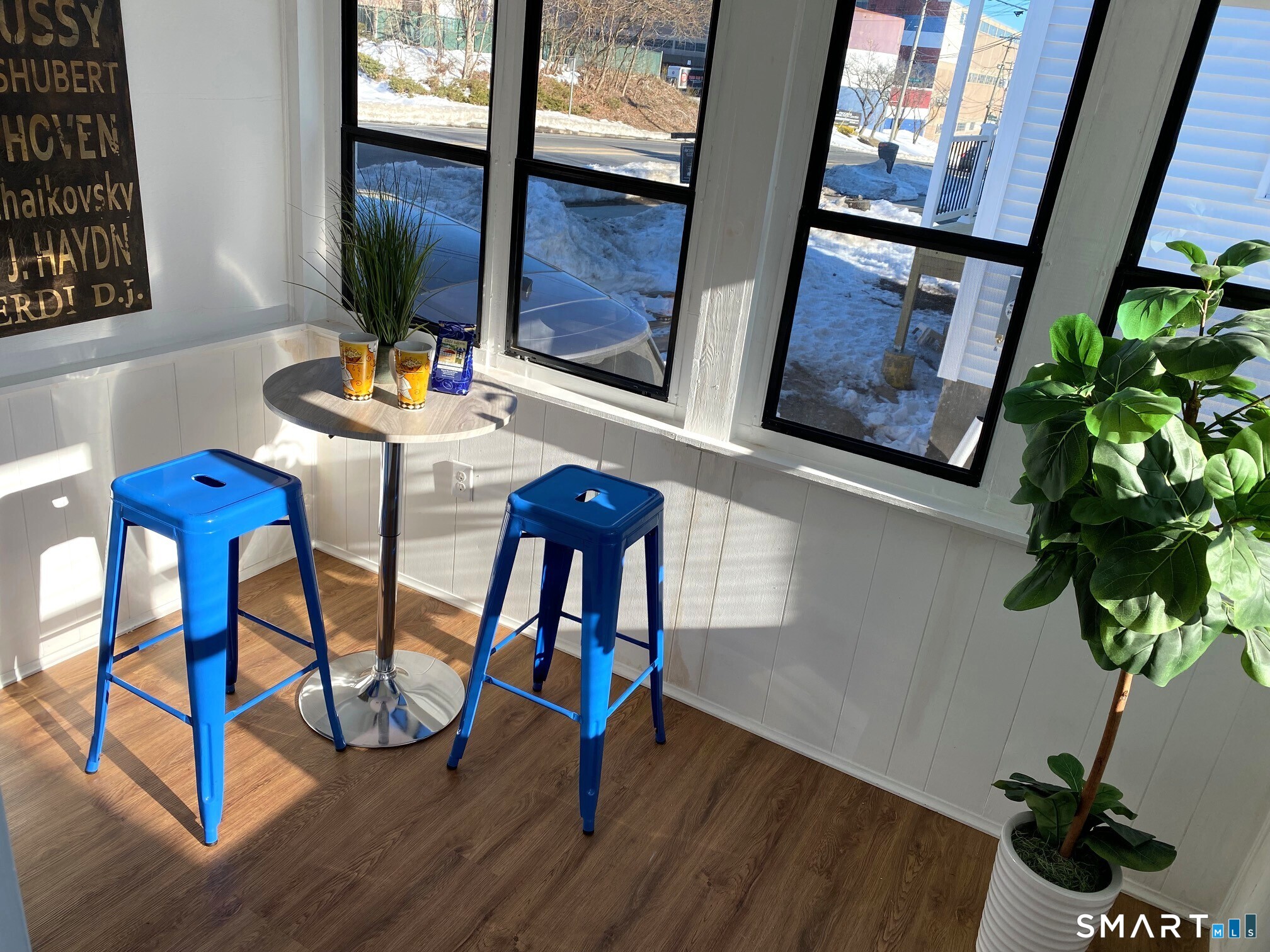 166 Saw Mill Road West Haven, CT 06516 - Photo 17 of 46 a view of a dining room with furniture and a potted plant