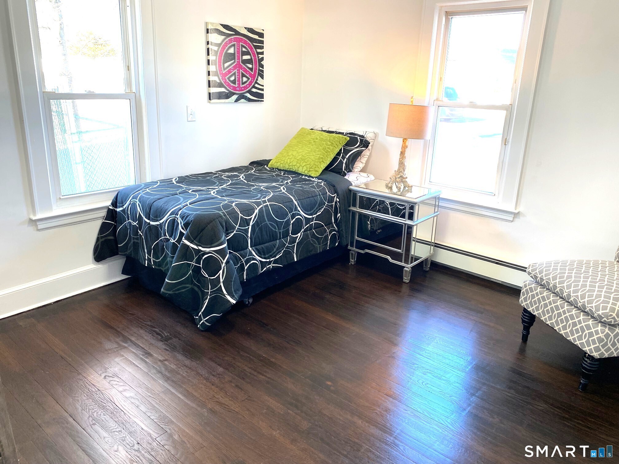 166 Saw Mill Road West Haven, CT 06516 - Photo 24 of 46 a bedroom with a bed and a window