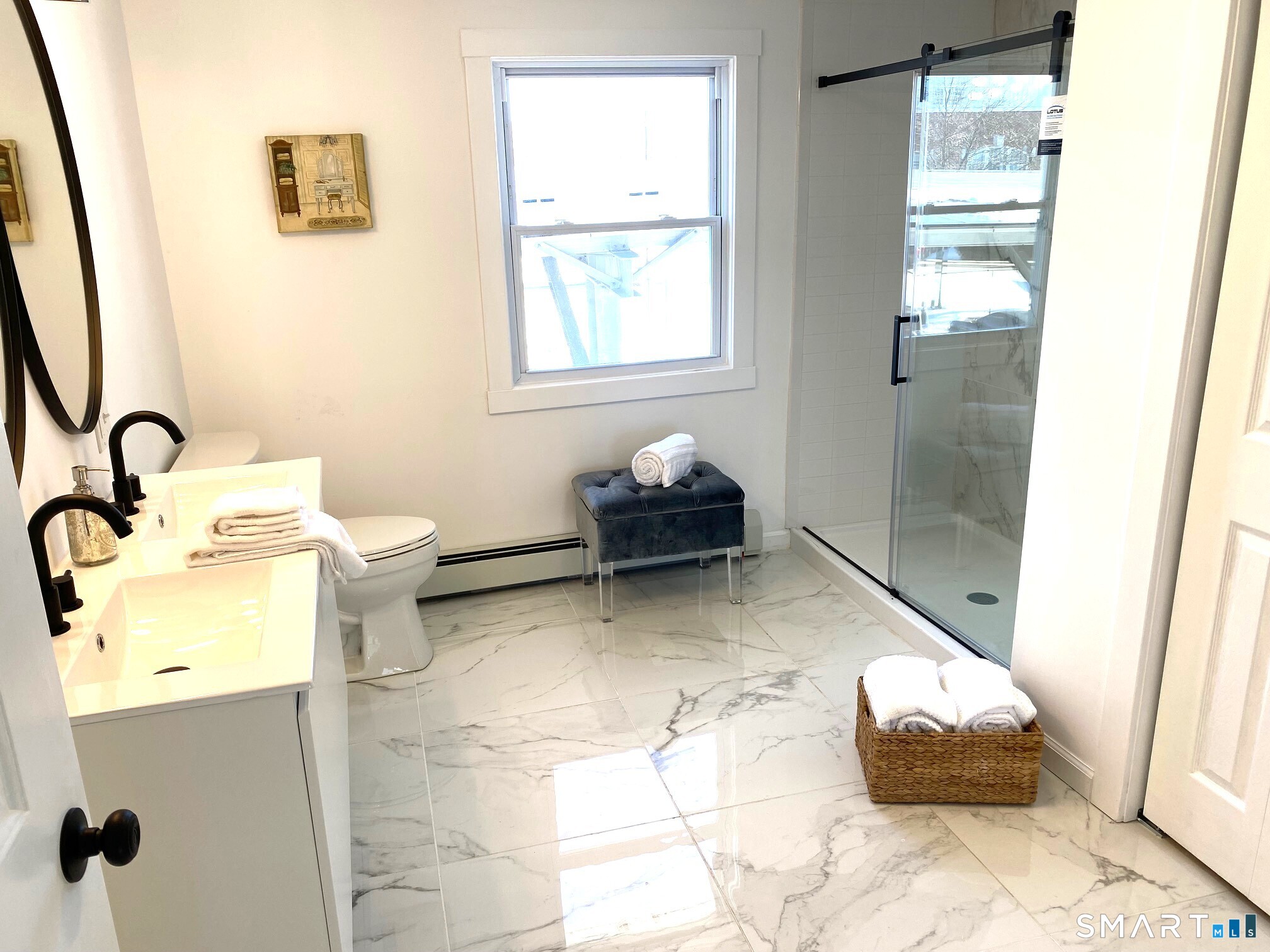 166 Saw Mill Road West Haven, CT 06516 - Photo 31 of 46 a bathroom with a sink toilet and mirror