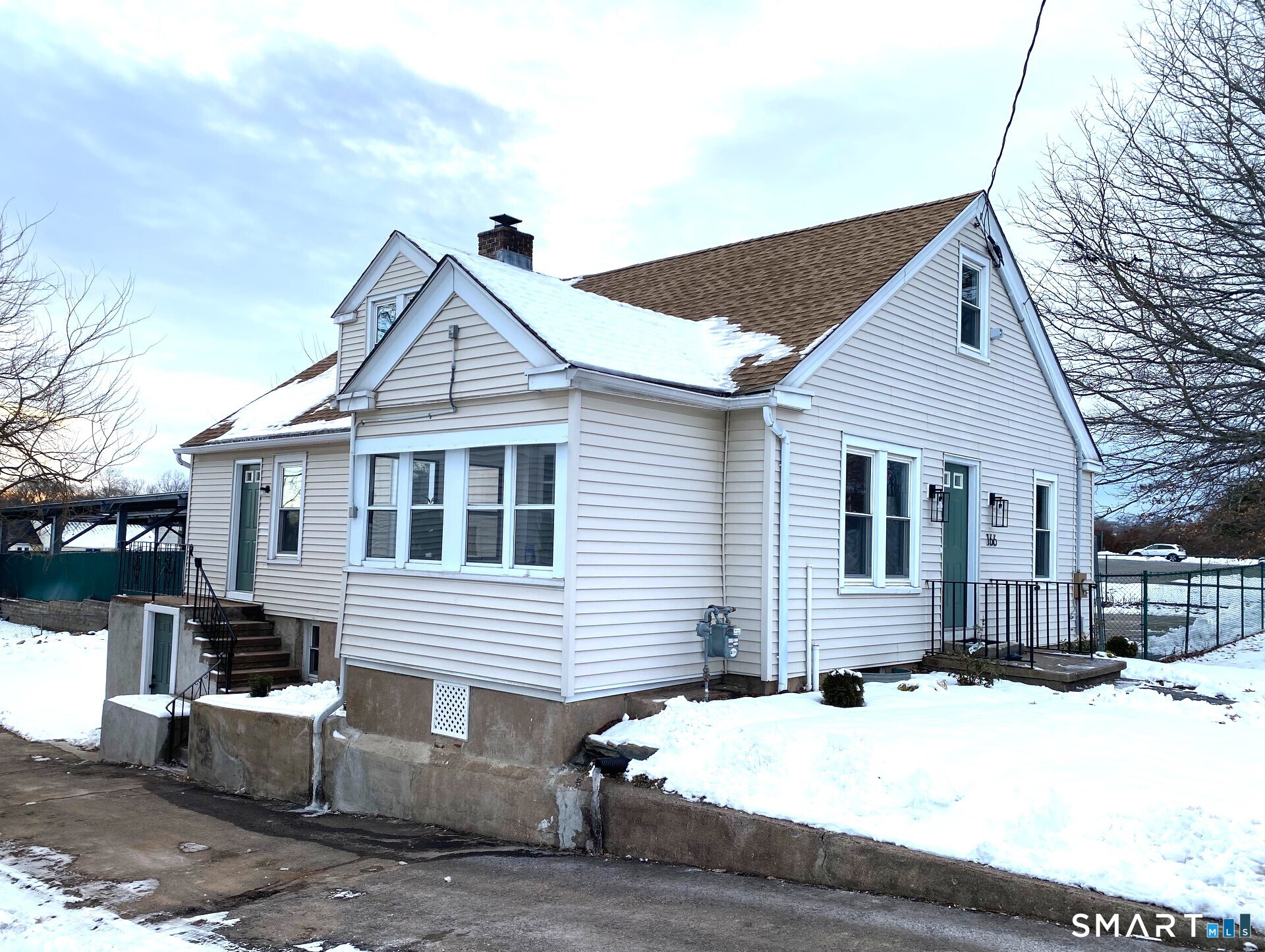 166 Saw Mill Road West Haven, CT 06516 - Photo 5 of 46 Low maintenance vinyl siding and windows.