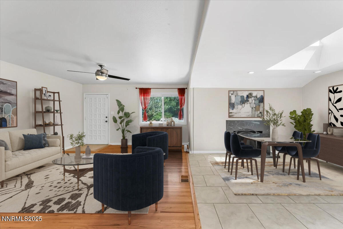 1375 Wesley Drive Reno, NV 89503 - Photo 2 of 35 a living room with furniture couches and a dining table with wooden floor