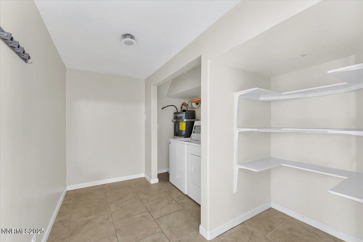 1375 Wesley Drive Reno, NV 89503 - Photo 22 of 35 a view of walk in closet with empty racks